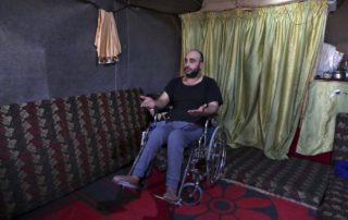 Syrian Refugee in Lebanon in wheelchair